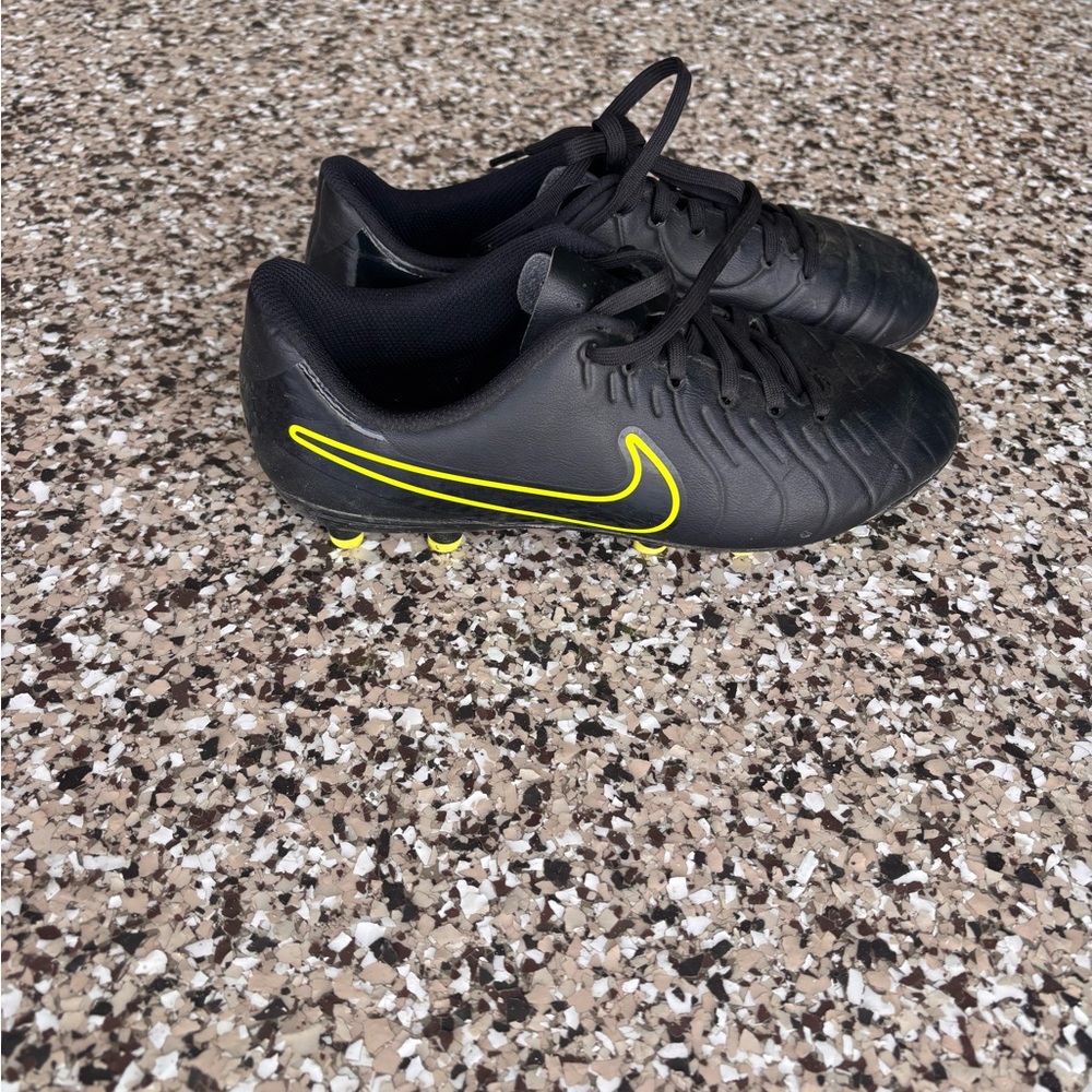 Nike Black Soccer Cleats with Yellow Accent